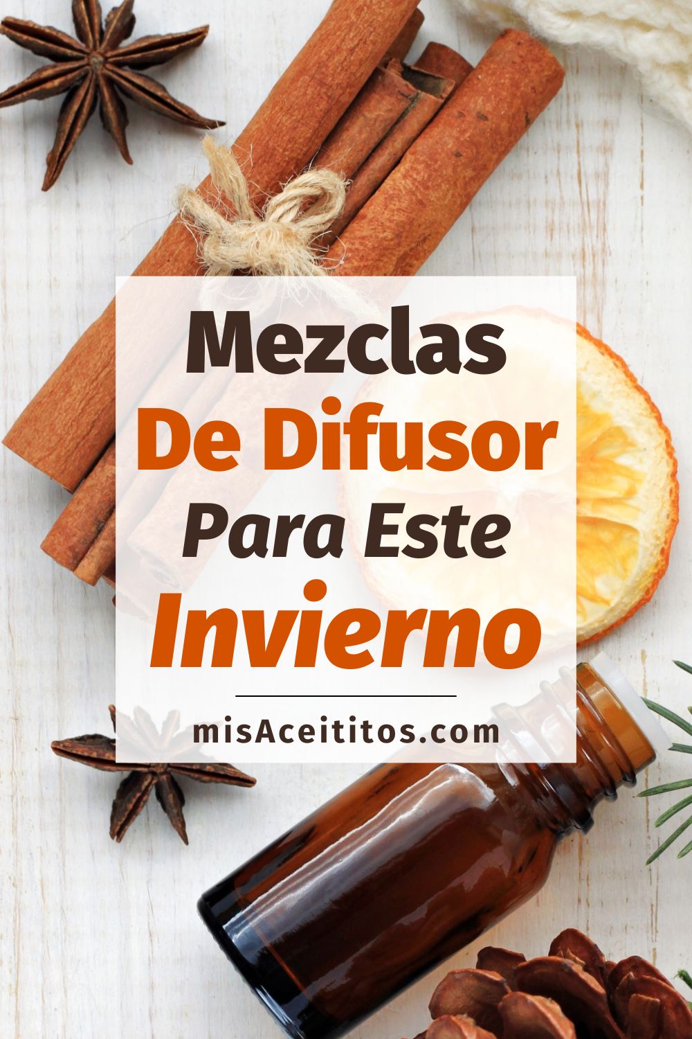 Aceites esenciales, naranja, canela en rama, anís, abeto, conos, manta de madera, vista superior.